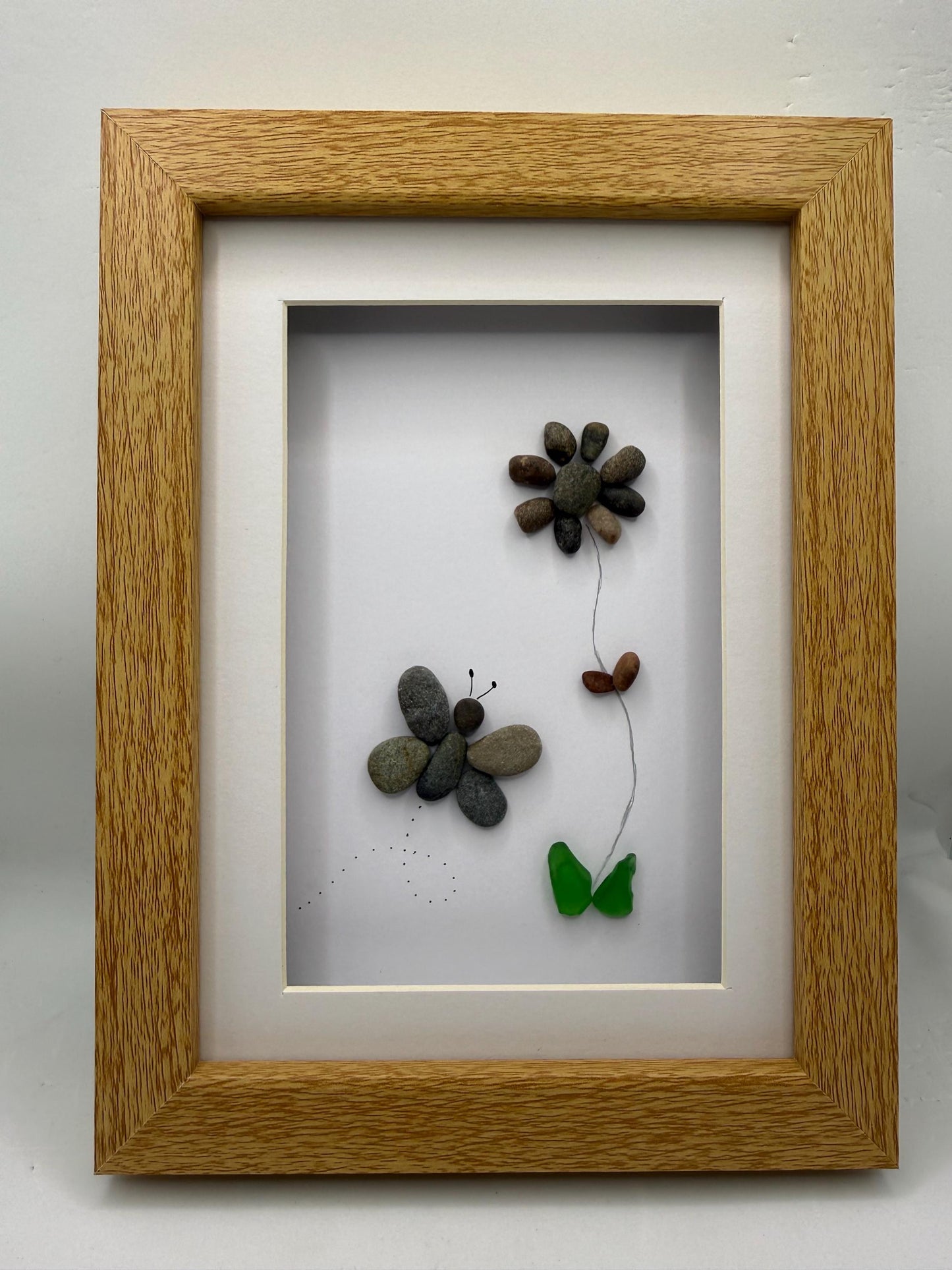 Butterfly and flower pebble art, pebble art, pebble art flower, sea glass, butterfly pebble art