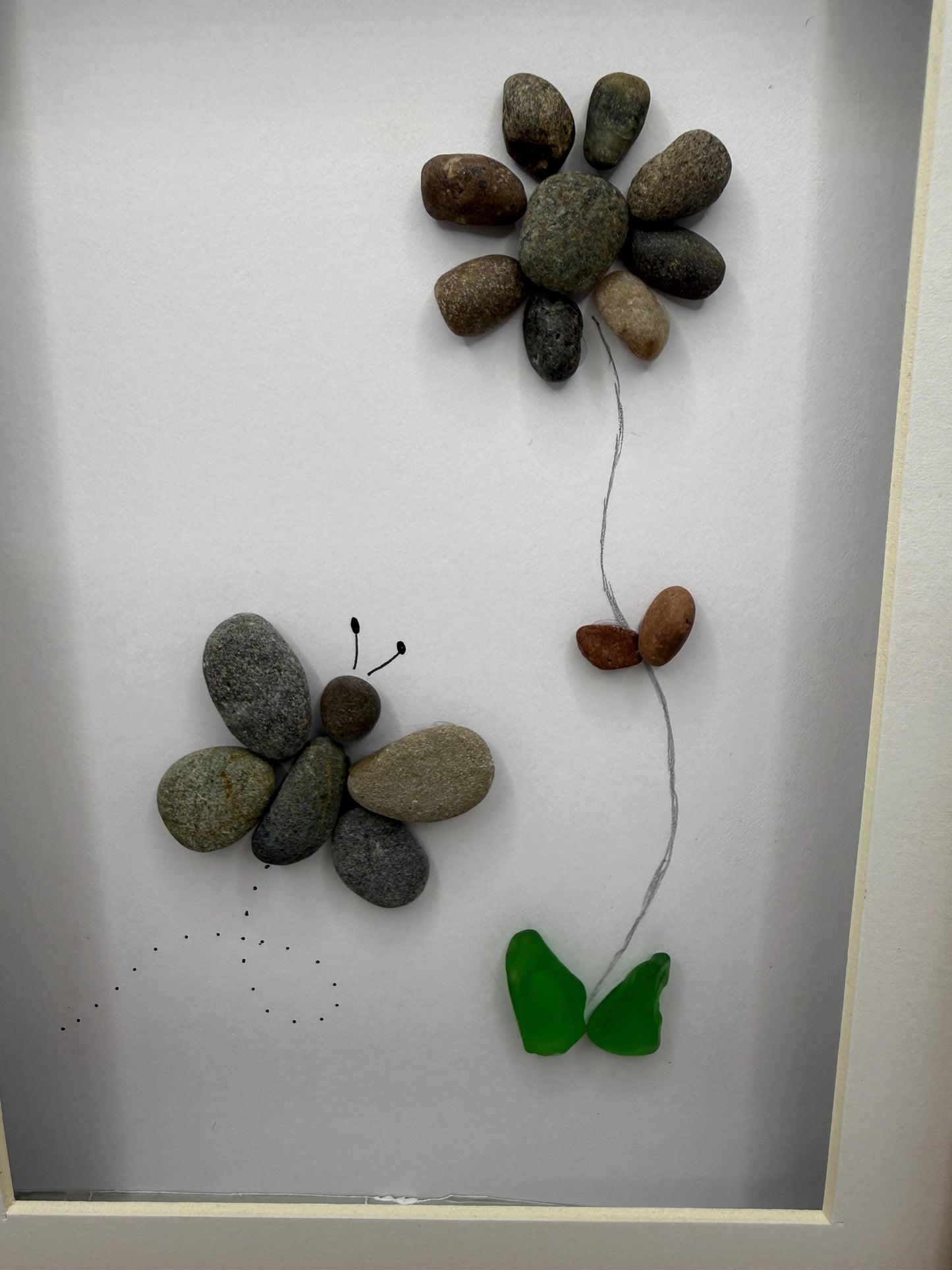 Butterfly and flower pebble art, pebble art, pebble art flower, sea glass, butterfly pebble art