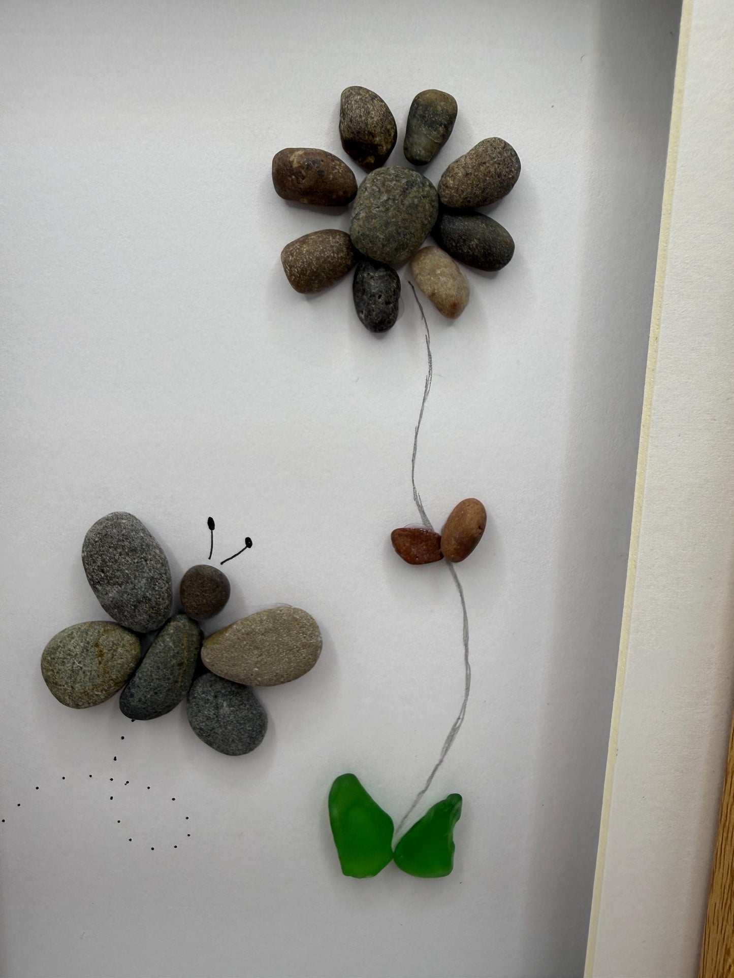 Butterfly and flower pebble art, pebble art, pebble art flower, sea glass, butterfly pebble art