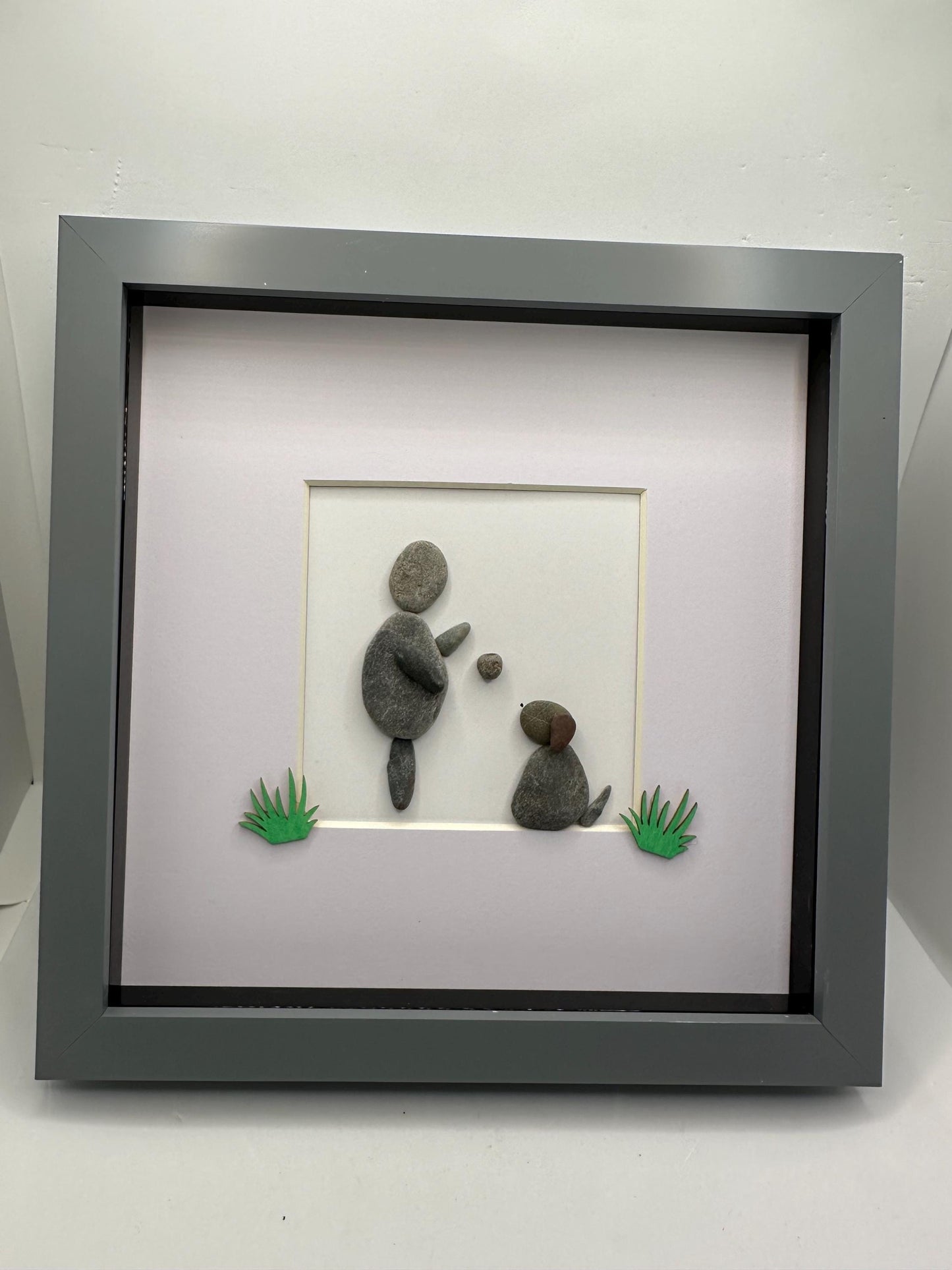Dog pebble art, dog owner pebble art, pebble art, dog and man pebble art