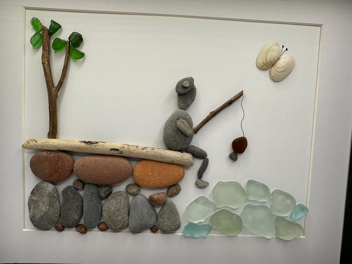 fishing pebble art, fisherman pebble art, gone fishing, pebble art, Father’s Day pebble art